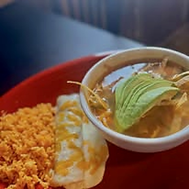 Soup and enchilada plate